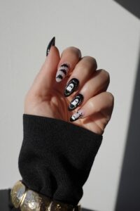 Spooky Black and White Ghost Nails for Halloween